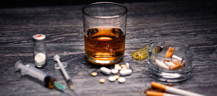 Glass of liquor and other drugs