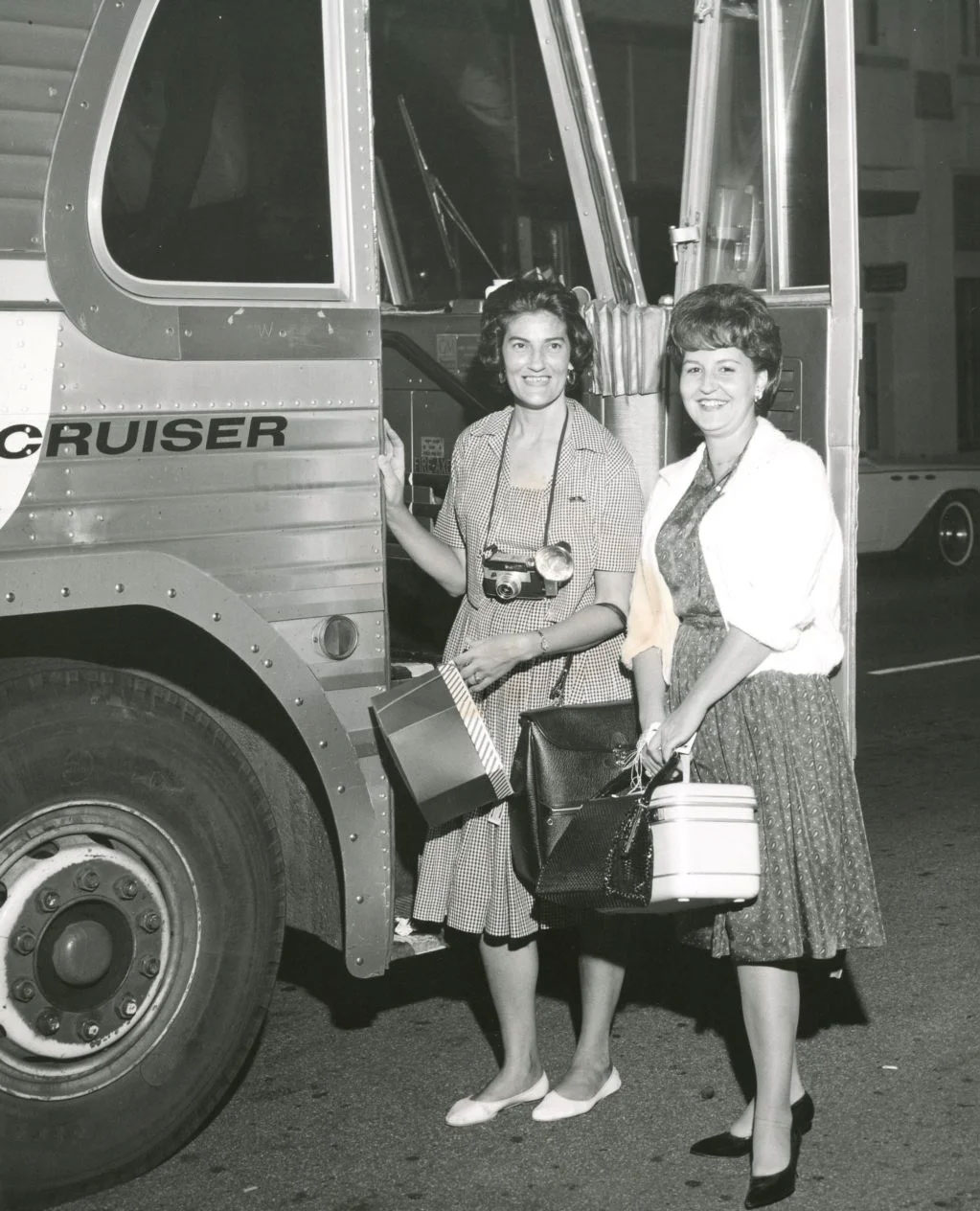 women waiting to get on a bus